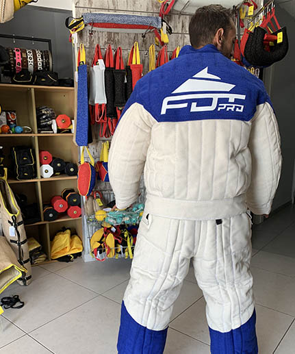 bite suit protection clothing white and blue